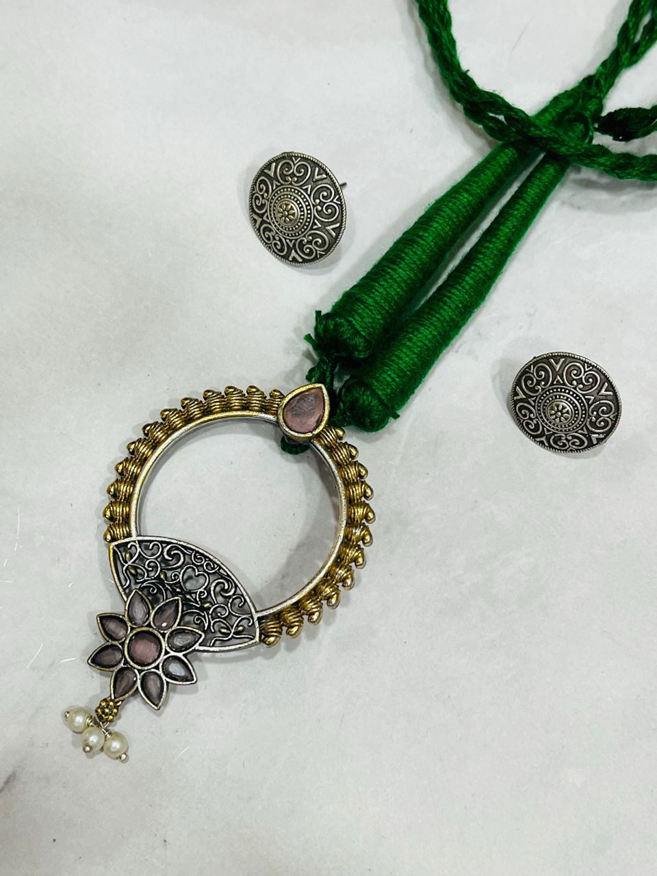 Handcrafted Dual-Tone Pendant Necklace with Green Thread & Floral Motif