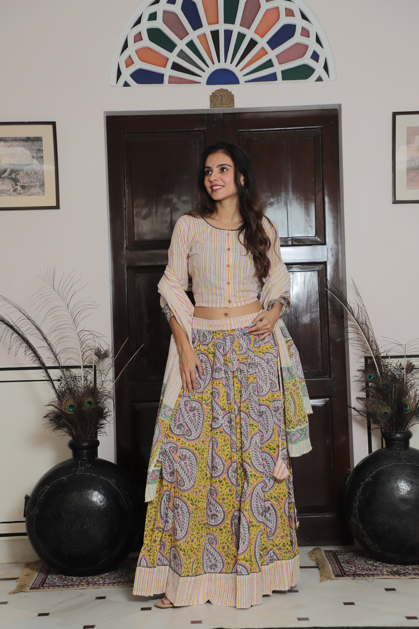 Vibrant Yellow & Pink Paisley Print Lehenga with Striped Cotton Choli