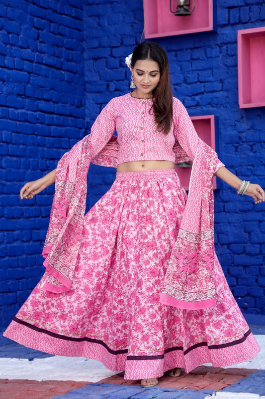 Vibrant Pink Floral Lehenga with Contrasting Geometric Print Bell Sleeve Choli